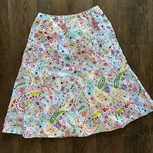 Size small paisley bright color print Orvis skirt.  Like new.